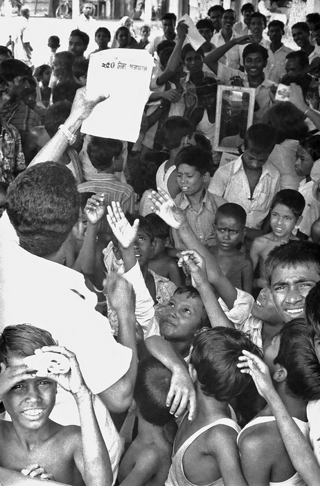 1975 Bangladesh. Distributing smallpox reward information leaflets
