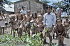 1975 Bangladesh. Villagers greet the team