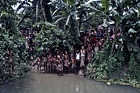 1975 Bangladesh. Villagers greet the team